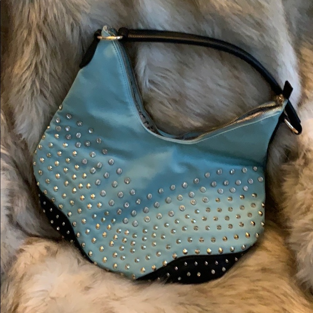 Faux aqua and black leather handbag